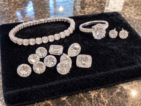 Diamond tennis bracelet, ring, studs, and loose diamonds Marty buys